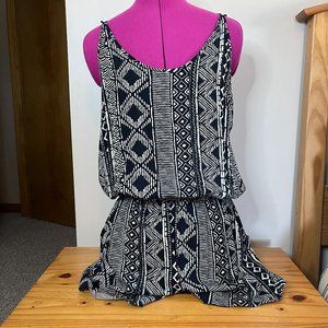 Womens BCX Black printed Romper size Large.